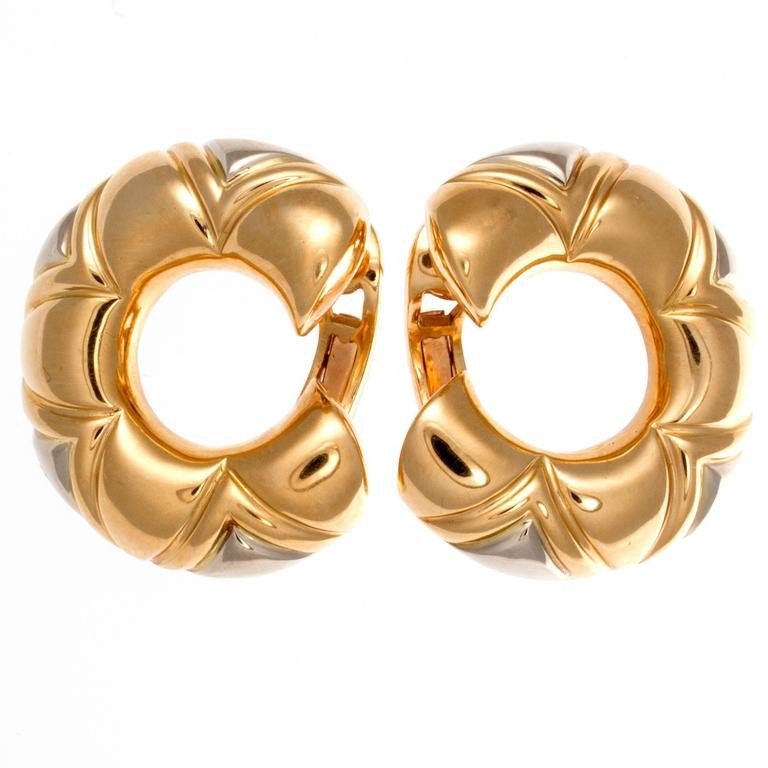 Bulgari Gold Earrings: Stylish, golden earrings from Bulgari. Designed in 18k gold. Signed Bvlgari. Maker: Bulgari Country: Italy Period: Modern Metal: 18k Gold Condition: Excellent Date of Manufacture: 2000's Free shipping