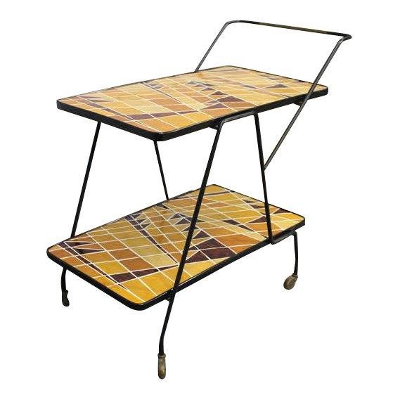 Vintage Italian Tea Cart: Vintage Italian Tea Cart in the style of Roger Capron with two enameled tiers top. 4 brass wheels. Height: 24" / 60.96cm / 30" all the way up to the handle Width: 16" / 40.64cm Length: 34" / 86.36cm S
