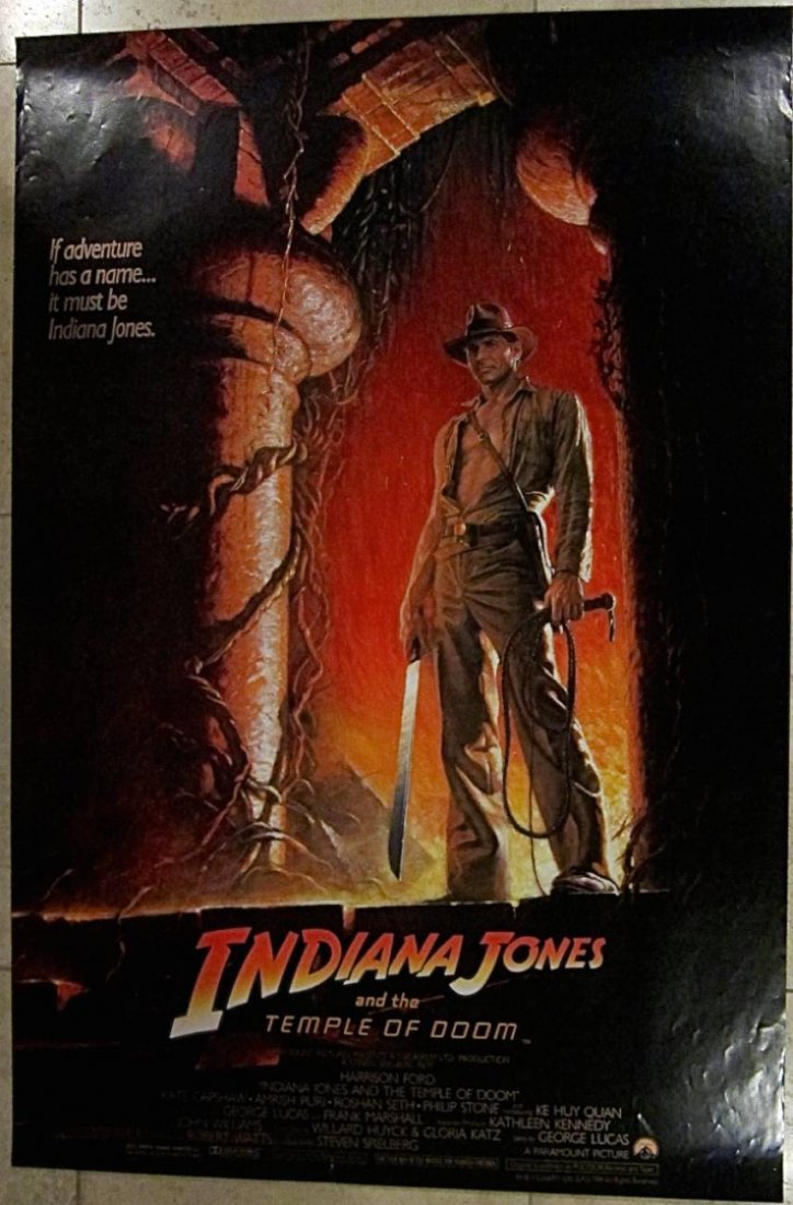 INDIANA JONES & THE TEMPLE OF DOOM '84 WOLFE 1 SH: INDIANA JONES AND THE TEMPLE OF DOOM (1984) Size: Original U.S. One Sheet (27" x 41"). Condition: Displays overall in Fine Condition. Original 'Wolfe Style' One Sheet for the 1984 George Lucas classic