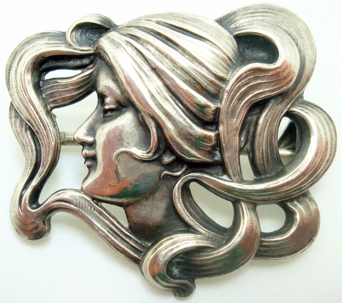 Art Nouveau Kerr Sterling Pin in Shape of Woman: Astonishing Art Nouveau, Kerr sterling brooch in the shape of a woman's profile. Measurements for the pin are 40x35mm and 1 1/2"x1 1/4". It weighs 7.2 dwt and the brooch dates between the 1900-1910's.