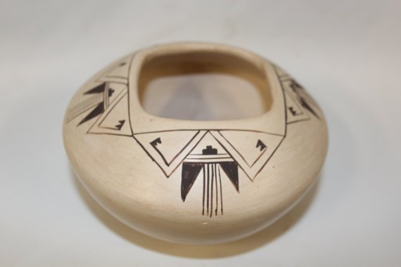 Native American Hopi Pottery Bowl, Signed By Blue: 1976 brown on cream geometric design signed by Blue Smokes and is 3"x5". “Pueblo pottery is made using a coiled technique that came into northern Arizona and New Mexico from the south, some 1500 yea