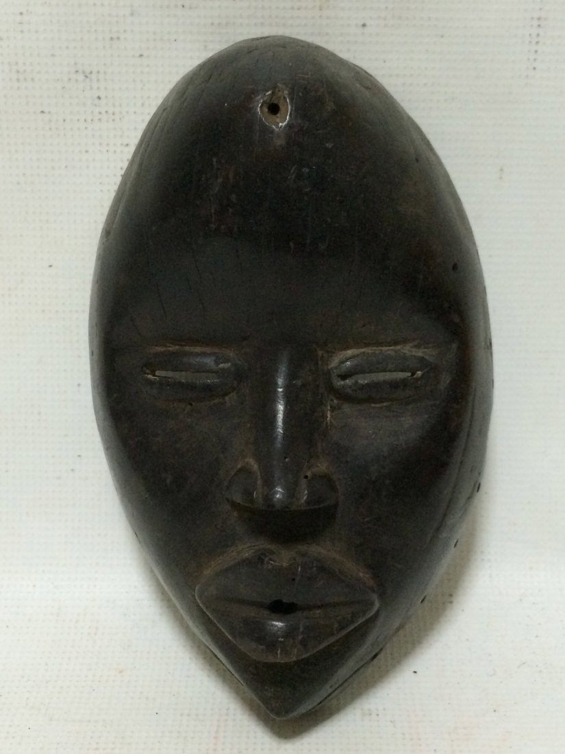 Dan Mask: African Art Dan Mask from Ivory Coast 10"H x 6.25"W No Reserve Buyer pays shipping. This item ships from New York, NY