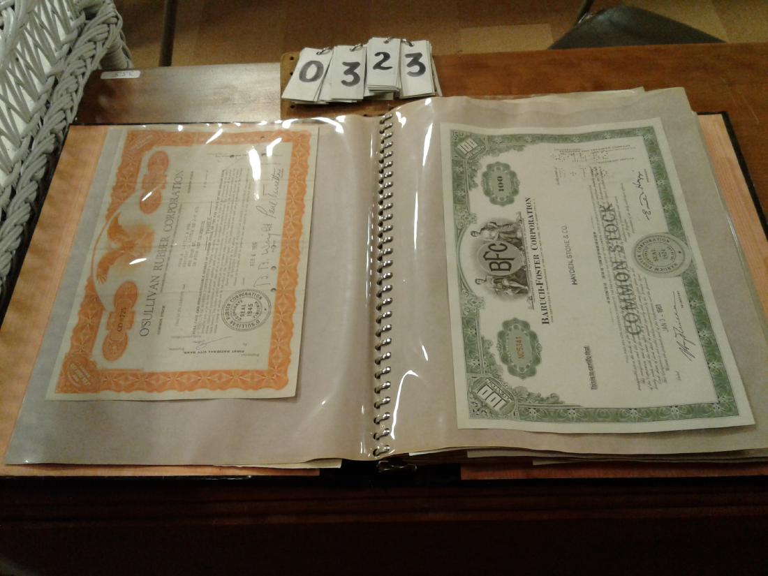 Old Stock Certificates In An Album: 50+ old stock certifcates in an album of American Tobacco Co., Glen Alden Co., Grand Union Co., Eastern Gas + Fuel Assoc. and many more (sold as set)