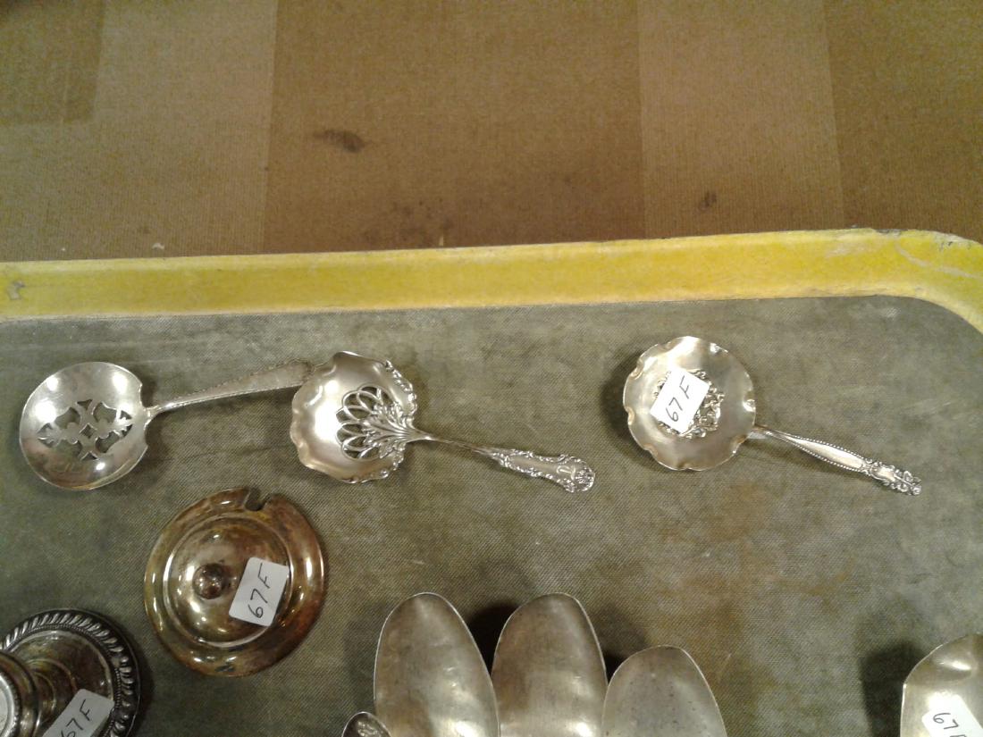 18 Pieces of Sterling & Coin Silver: Set of 6 Coin Silver Spoons(1 small silver shell shaped- 4 serving 1 dinner all worn), 6 weighted candles holders, 3 open used spoons, 1 bladed 1920's foldup pocket fruit knife, 1 cover for a jar & we