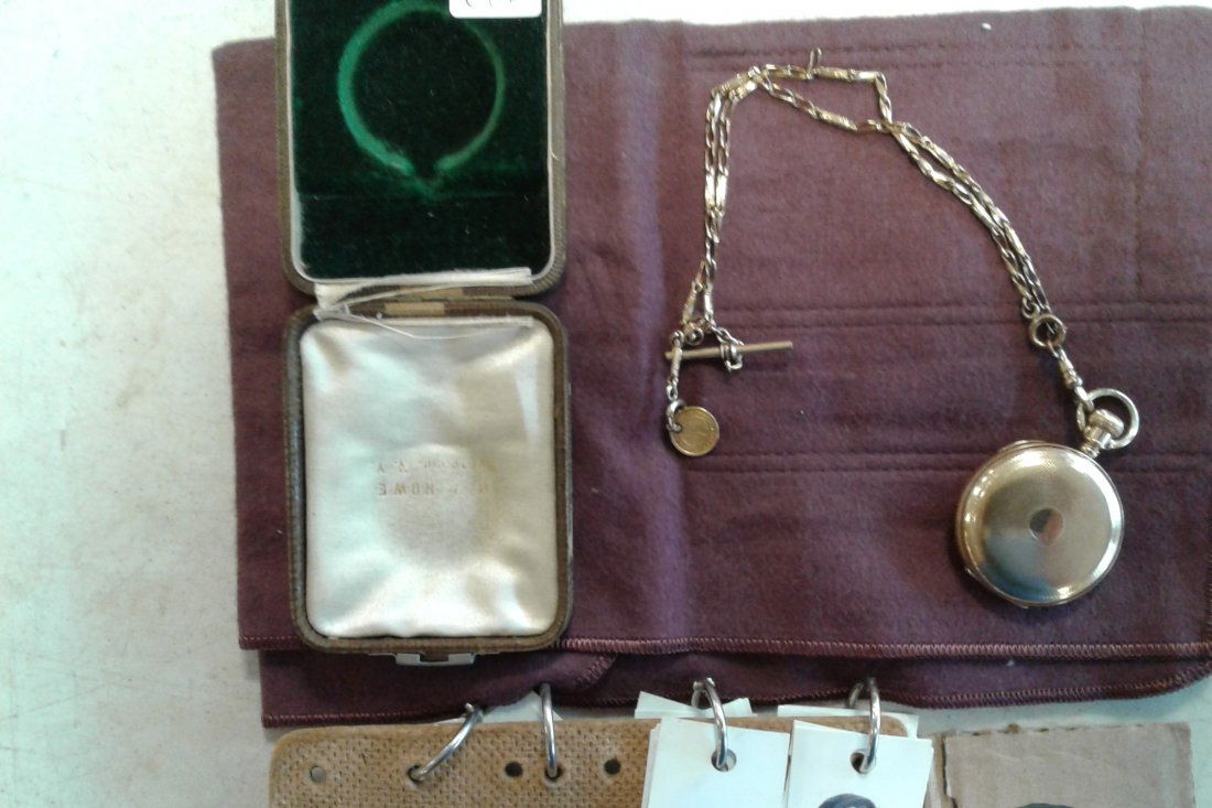 "Ideal "Closed Face Working Pocket Watch: Working pocket watch - "Ideal" closed face with fob + 1854; 1 dollar gold rush American drilled coin attached to the watch fob. (watch 1 3/4"W x 2"H; chain 24"L) sold as set