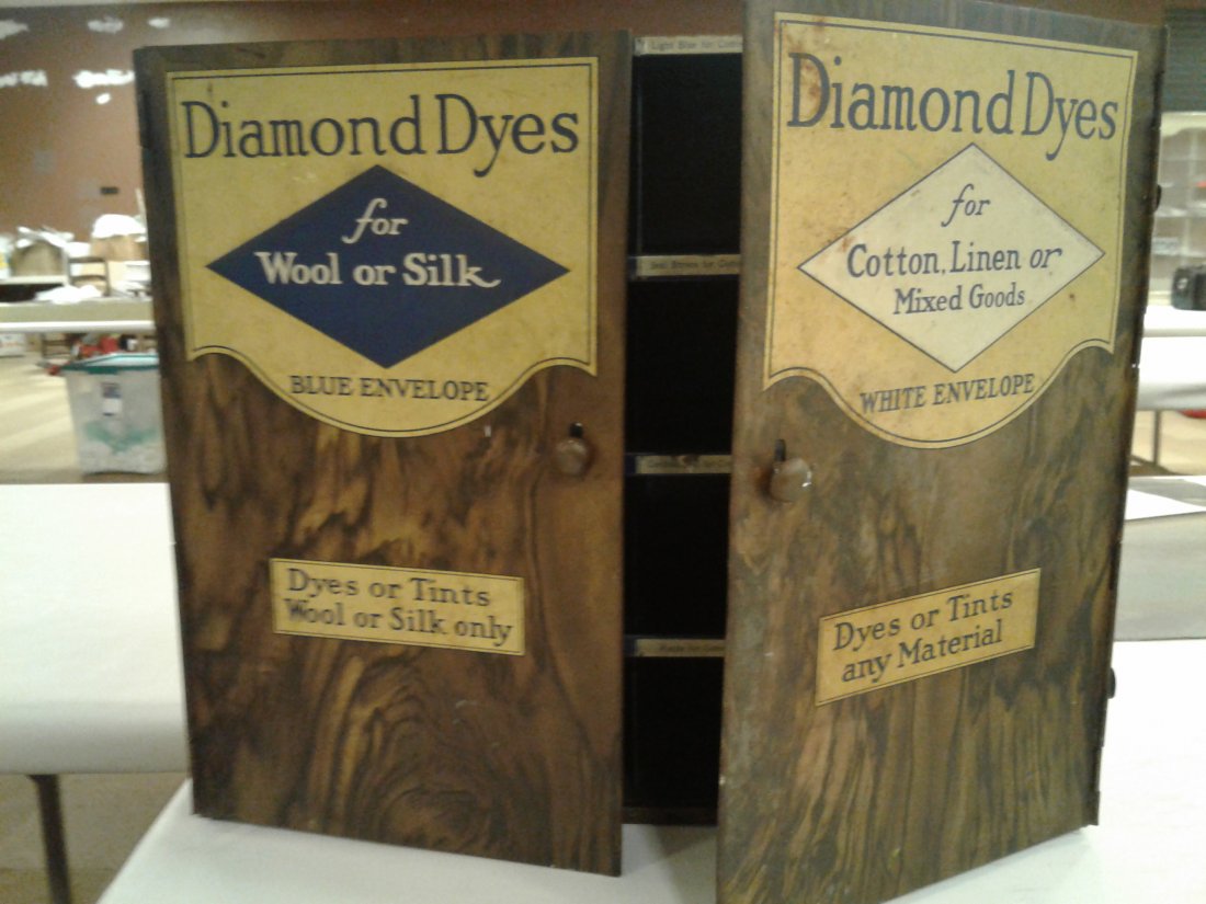 Wells & Richardson Co. Tin Diamond Dyes Cabinet: Diamond dyes for wool and silk, blue & white envelopes. Dyes & tints wool and silk only. This nice tin litho cabinet has 11 metal inserts missing & has normal scratches and wear-possibly Circa early 1