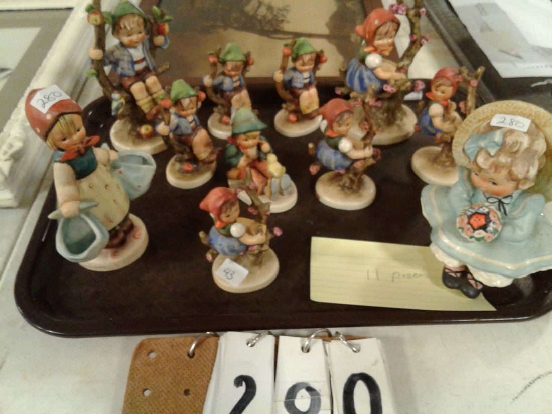 (11) Goebels + Hummel: Variety of 11 pieces - Goebels + Hummel's with a variety of marks + sizes (No information available for these: bid with this limited information). All are in excellent condition (sold as set)