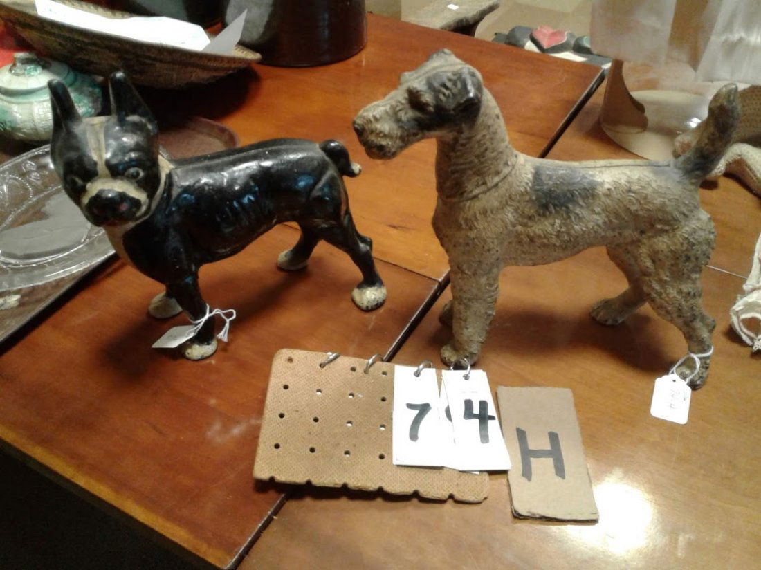 Pair of 1890s Antique American Iron Dog Door Stops: Estate pair of antique iron 1890s American dog door stops. (1)terrier? Iron-nice original paint door stop with black spot 10"H x 10 1/2"W; (1)bull dog 1890s black & white spotted(repainted)dog stop 9