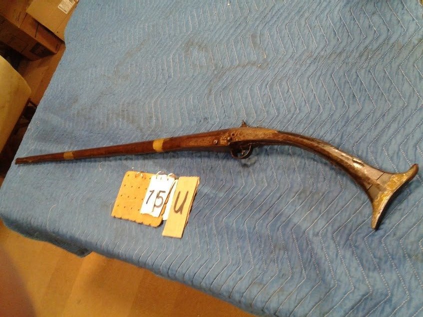 19C Muzzle Loading Middle Eastern Flint Lock Rifle: 19th Century muzzle loading Middle Eastern flint lock rifle with brass & iron fitting, all hand crudely made.