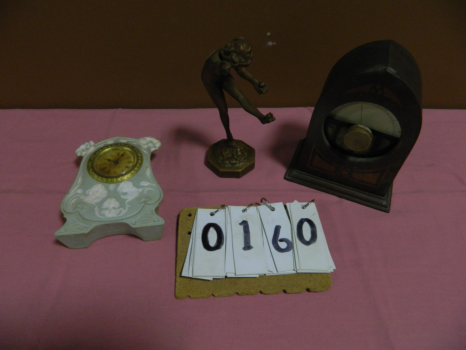 3 Antique Items for 1 Money: 1 1920s art noveau bronze patina over metal nude statue on a bronzed plaster base. 8"h x 2.75"w. 1 Bisque 3 art noveau womens faces and flowers on a Bisque Boudoir clock. 6"h x 4.5"w. 1 wind up mahoga