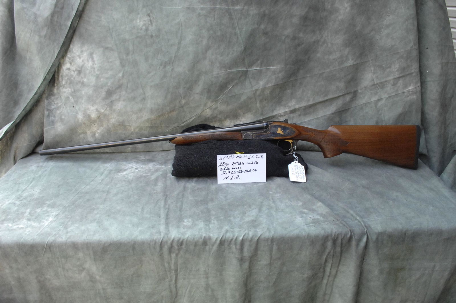 Marlin, L.C. Smith shotgun, N.I.B. (1 of 3)