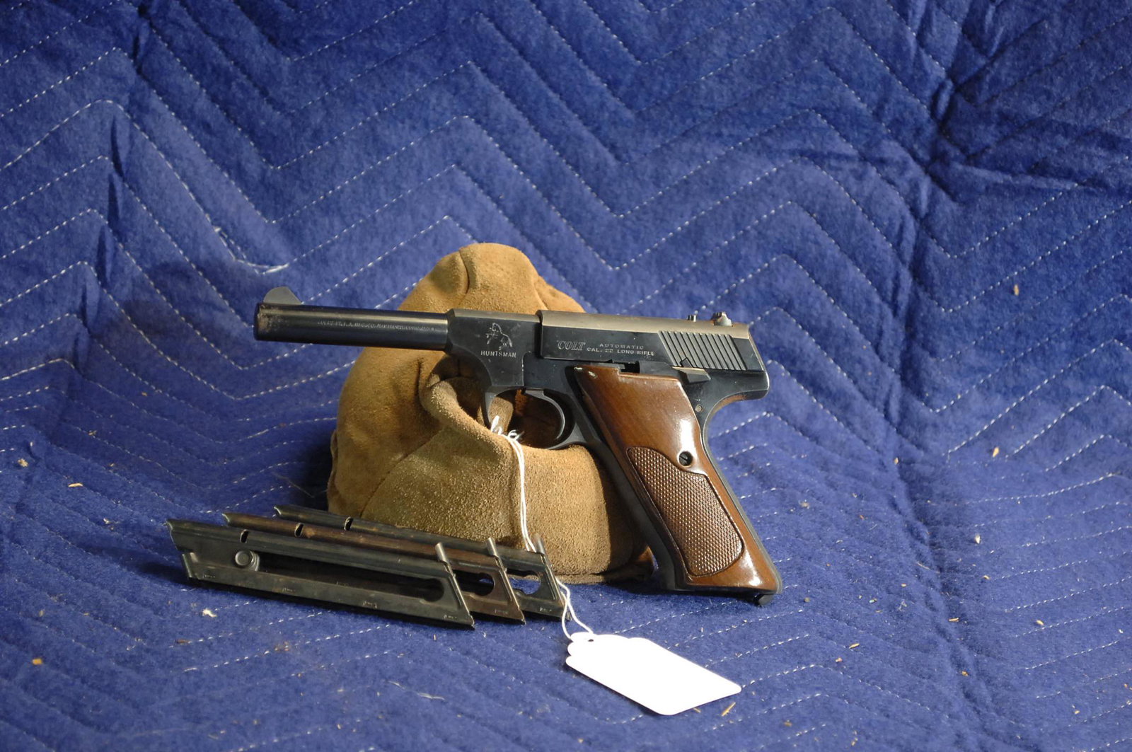 Colt, Huntsman pistol: .22 LR, 4" bbl, blue, slight pitting, very minor