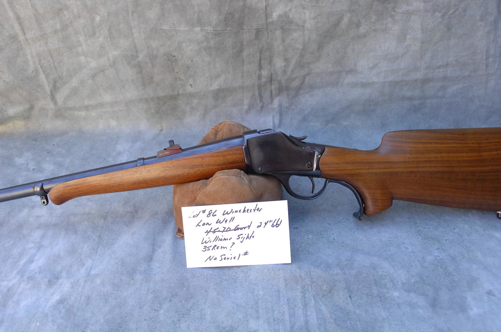 Winchester High Wall, customized lever: .35 cal (.35 Remington?), Williams sights fore & aft, glass bedded
