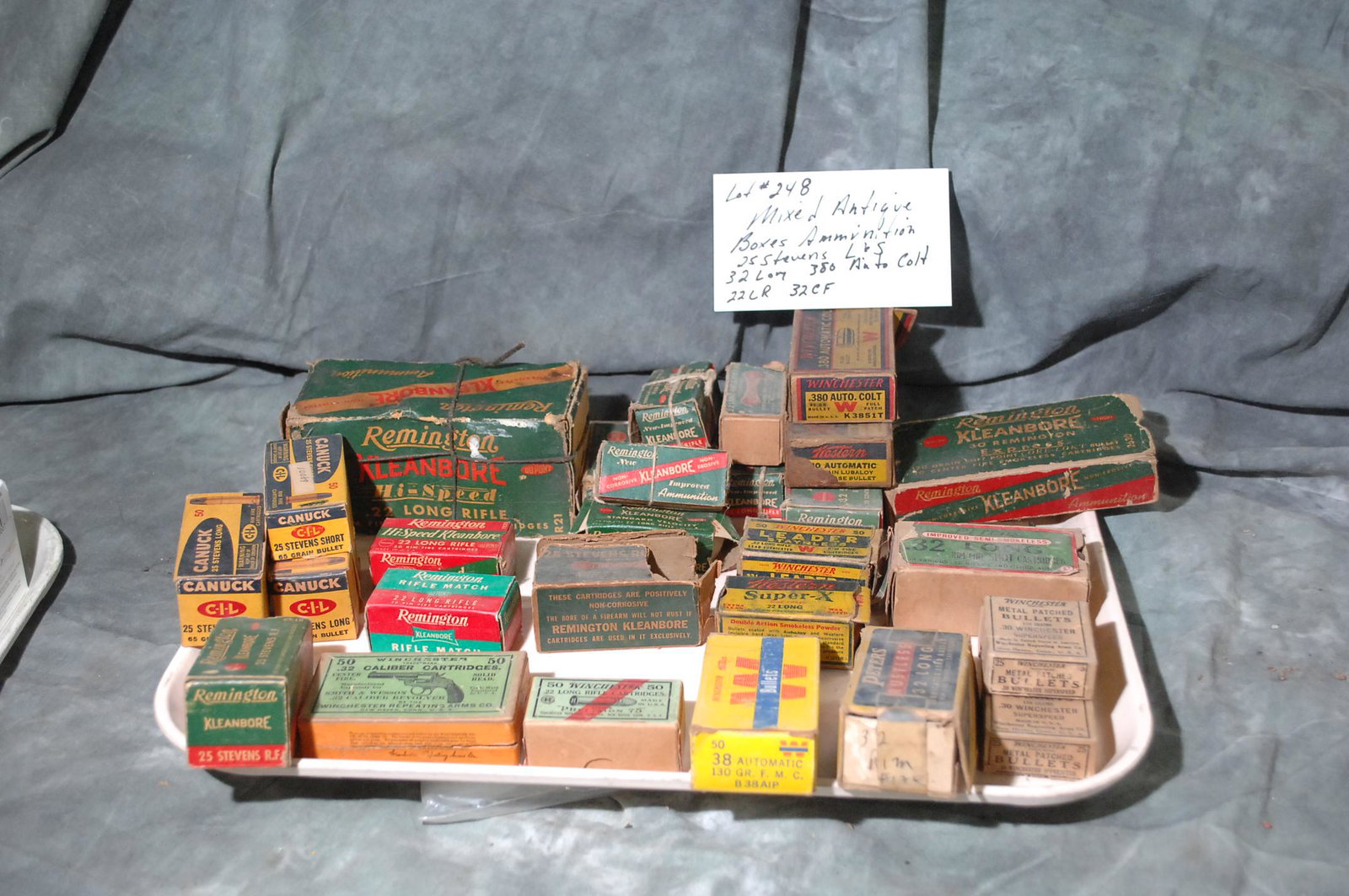 Mixed Antique boxes of ammunition: 25 stevens l & s, 32 long, 380 auto colt, 32 CF, 22LR