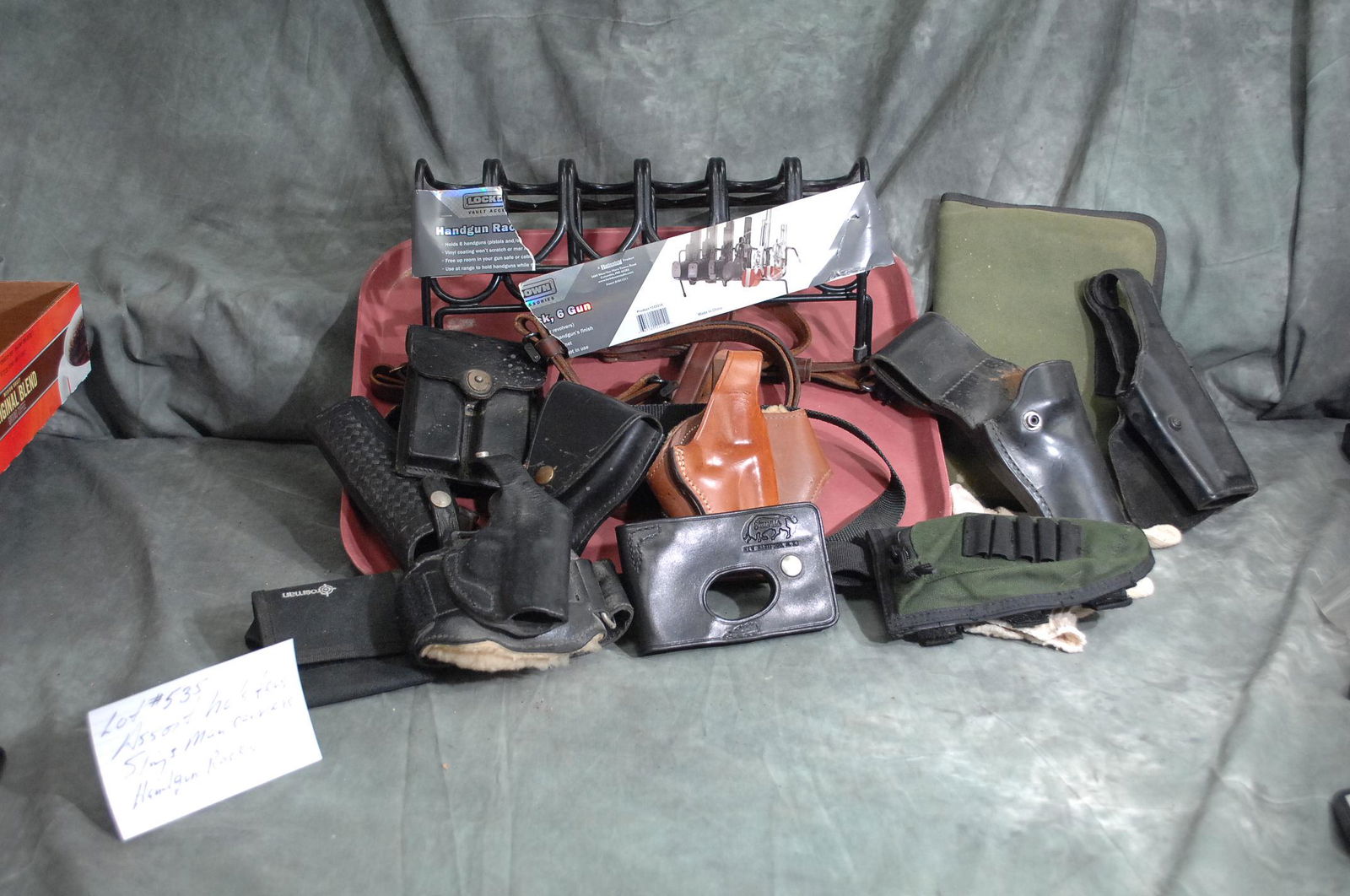 Assorted Holsters , Slings, and Mag Carriers: Assorted Holsters, Slings, Mag Carriers, and 2 Hand Gun Racks