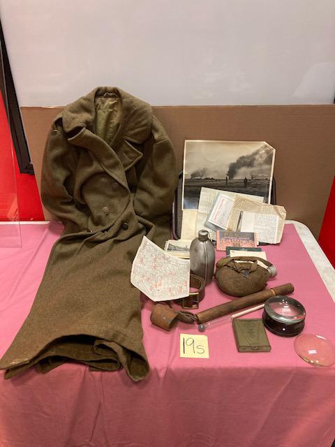 Miscellaneous American WWII Items: Miscellaneous WWII items to include: WWII coat, 2 canteens, belt, 2 magnifying glasses, maps, 1 large war photo, a hydrometer, WWII Paris maps and postcards. All from the WWII Estate.