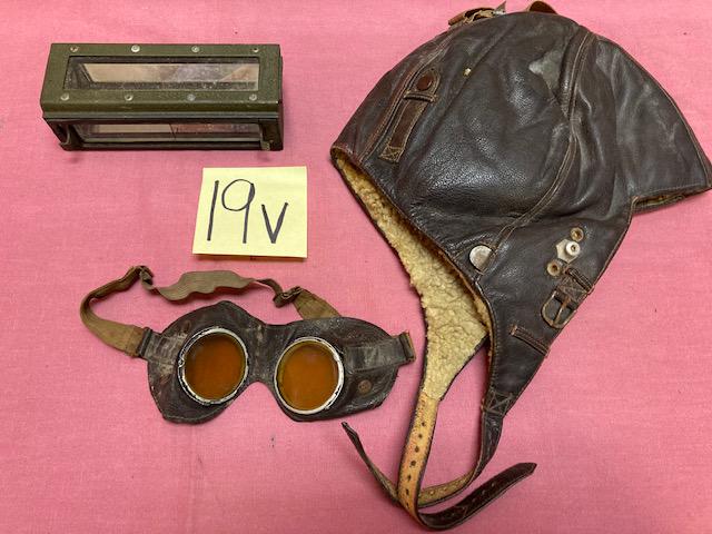 Miscellaneous German WWII Items: (1) German WWII tank Nazi leather and wool cap. (1) German WWII tank Nazi goggles. (1) German WWII tank Nazi view finder.