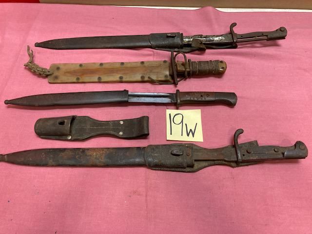 4 German WWII Bayonets: 4 German WWII bayonets in poor, battle-used condition. Sold as is.