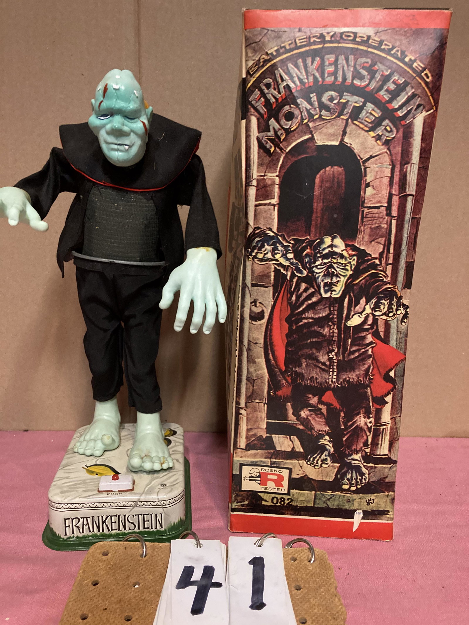 Frankenstein Monster #082 Rosko Toy in a Box: Battery operated Frankenstein Monster #082 Rosko Toy in a Box. Mint condition. Unknown if the toy works. Box has creases in the cardboard but is not ripped or open. 13.5"h x 4"w. Unreserved from the C