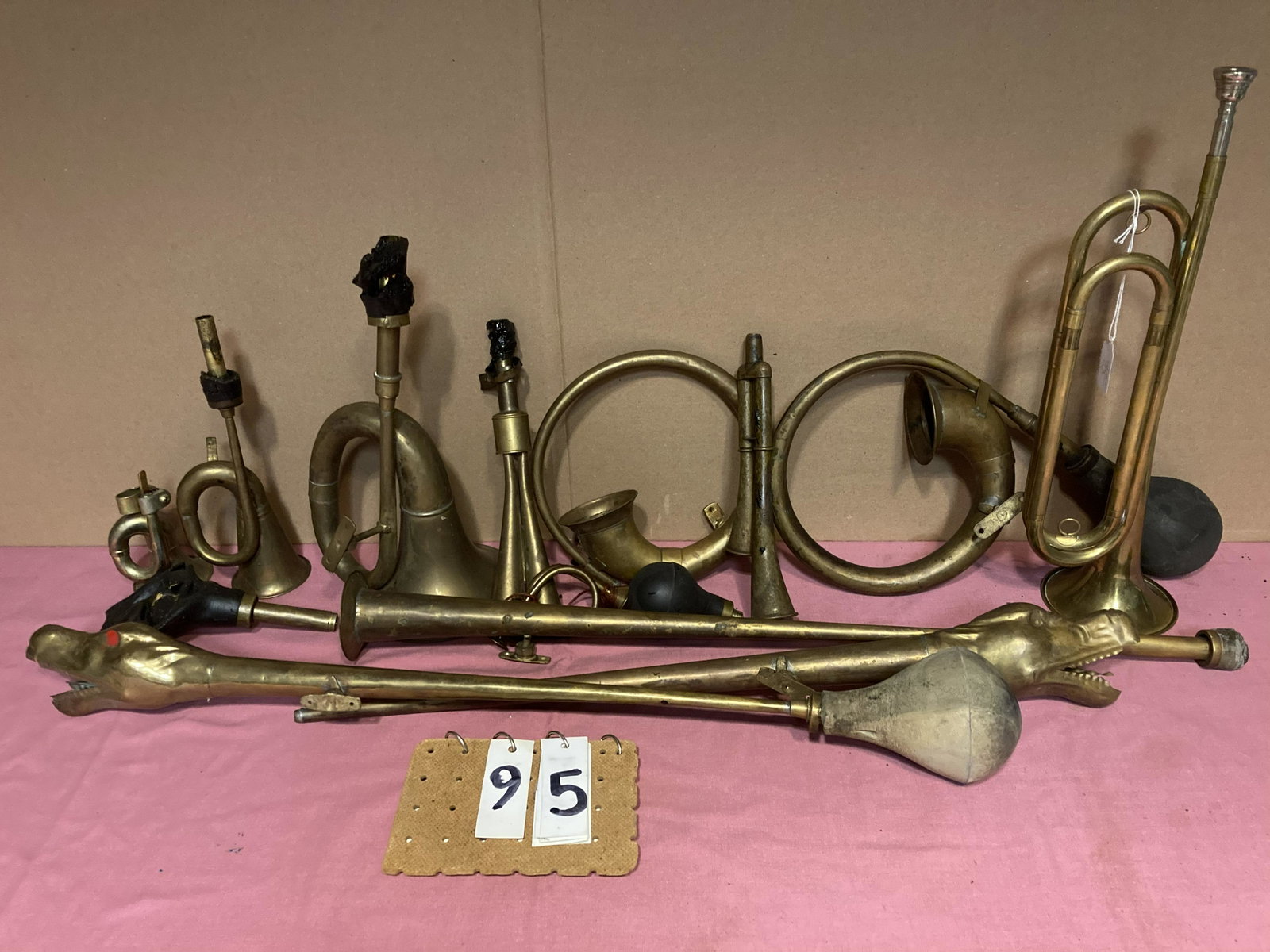 12 Brass Trumpets and Horns: 12 Brass trumpets and horns. Made in the USA. Some need restoration. Unreserved from the Conyngham, PA Estate. Fresh to the market.