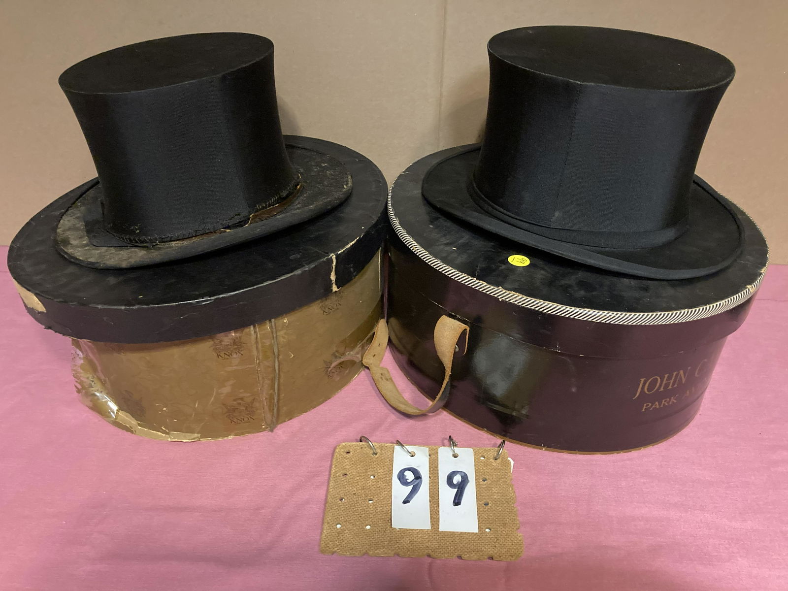 2 19c Top Hats with Boxes: (1) Scott and Co. Hatters to the Ring and Royal Family. 1 Old Bird Street, Piccailly. 12.5"l x 10.5"w x 6"h. (1) Silk Top Hat. Recognized Standard of Excellence John Kavanagh, Ltd. Park Avenue. 12"l x
