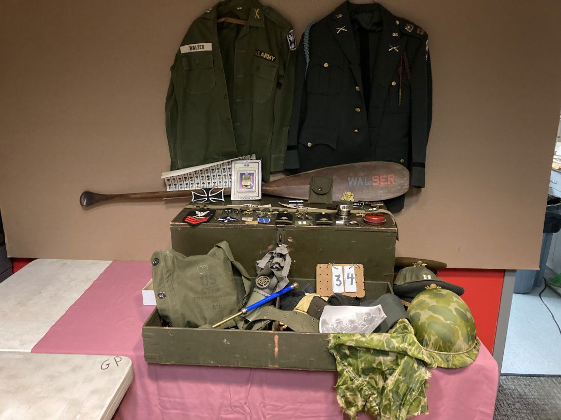 Korean War F.H. Walser Foot Locker With Contents: Korean War F.H. Walser (2nd LT from Fort Benning, GA) foot locker contents. Contents to include: uniforms, hats, helmet, canoe paddle, pins, 2 gas masks, misc. clothing, maps, instruction manuals, col
