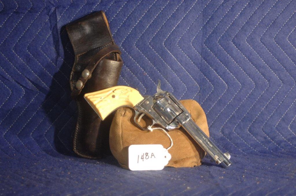 H. Schmidt, Ostheim/Rhoen SA Revolver: H. Schmidt, Ostheim/Rhoen SA revolver. 22WMR. Nickle, 4.75" bbl. White plastic grips. With holster. Marked "Dave's House of Guns". Serial No. 480233.