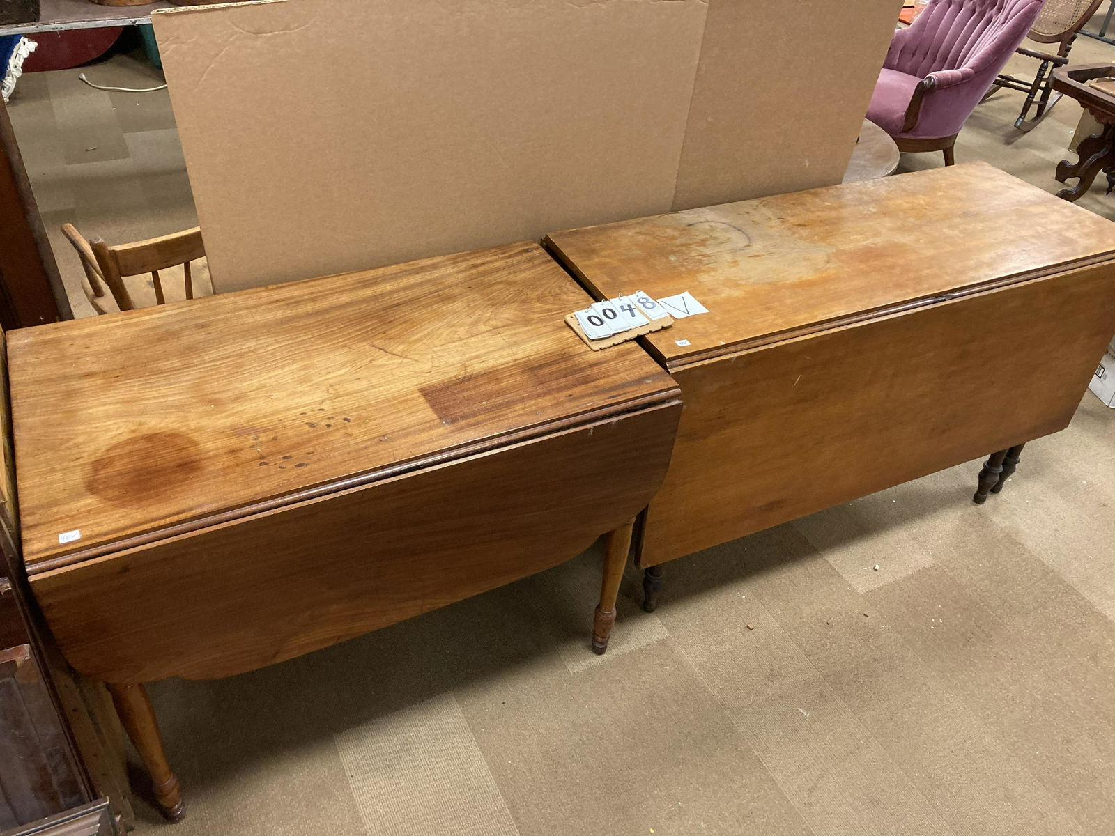 Two 1830s American Drop Leaf Tables: Two 1830s American Drop Leaf Tables. (1) Long drop swing 6-leg solid maple table. 29"h x 48"w. (1) American solid mahogany drop leaf table. 29"h x 37.5"w. From the Norwich, NY Estate.