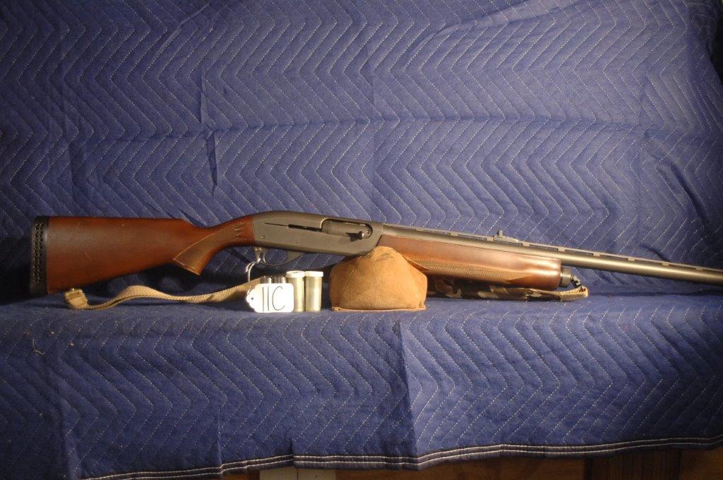 Remington Model 1100 Magnum: Remington Model 1100 Magnum. 12 gauge 3" shells. 26" bbl. Rem chokes with 5 tubes (turkey extra full, full lead, improved lead, mod lead, full steel). Turkey sights and carry strap. Serial No. P145439