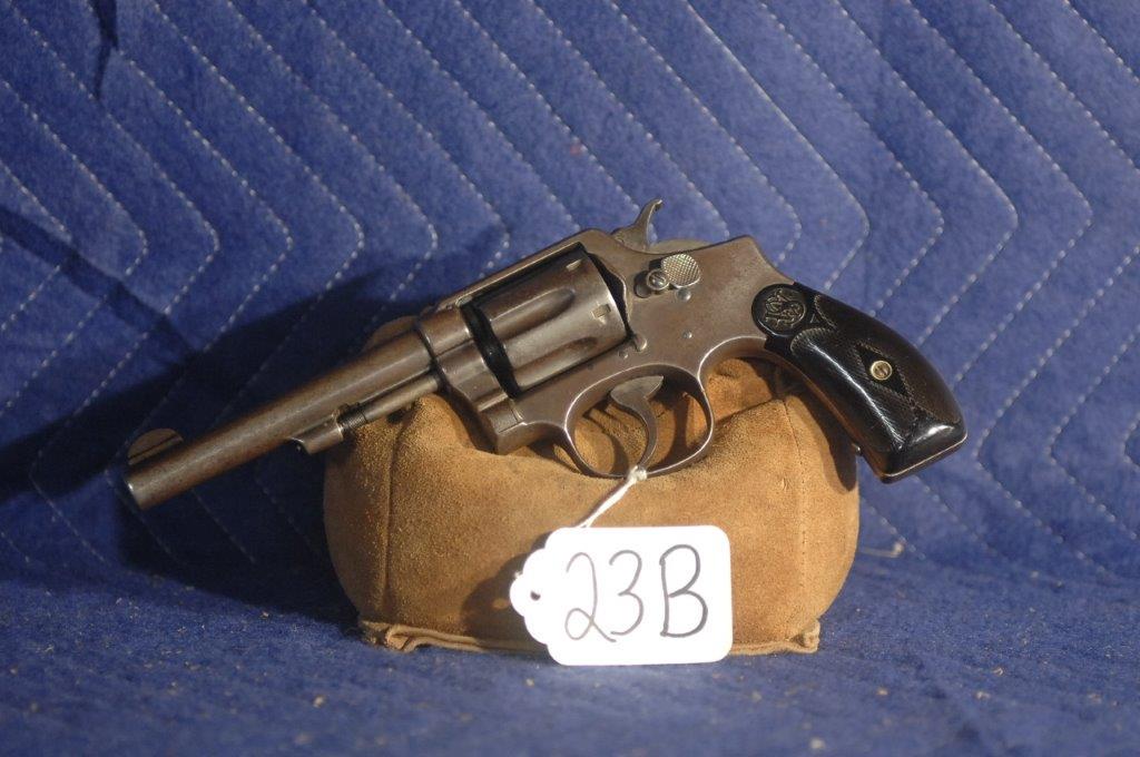 S&W M&P: S&W M&P 38 special revolver. 5" bbl. Blued. Missing ejector knob. Serial No. 31575.
