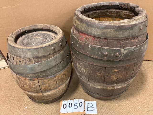 Two 1900s West End Beer Oak Beer Kegs: Two 1900s West End Beer oak metal strapped beer kegs. (1) 23.25"h x 19" dia. (1) 19"h x 16"d. From the Beeches Mansion Estate in Rome, NY.