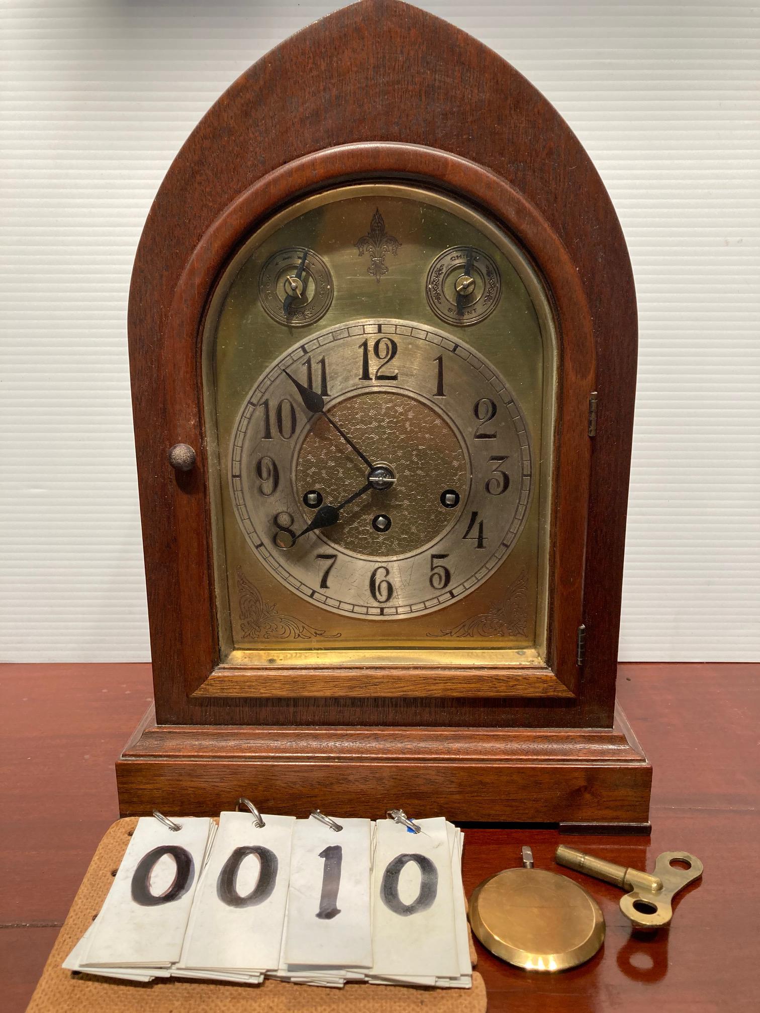 Seth Thomas Mahogany Clock: 1900s Seth Thomas time, strike and alarm, mahogany clock with key. Unknown if it works. It is an honor to sell such high quality estate items from a beautiful home located in historic Skaneateles, NY.