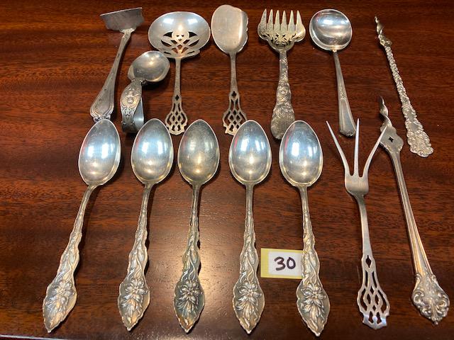 14 Sterling Silver Flatware Pieces: 14 sterling silver flatware pieces to include: (9) fancy serving spoons and (5) fancy matching spoons. Total weight is 18.23 troy oz. It is an honor to sell such high quality estate items from a beaut