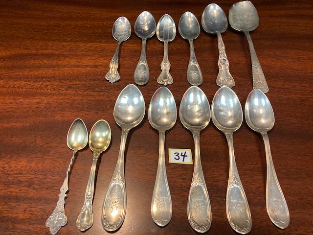 13 Sterling Silver Spoons: 13 sterling silver spoons to include: (1) Rock-a-bye baby from the tree top sterling baby spoon, (5) McMillian and Hamilton matching sterling spoons marked L.C. Yates with hand engraved lions on the h