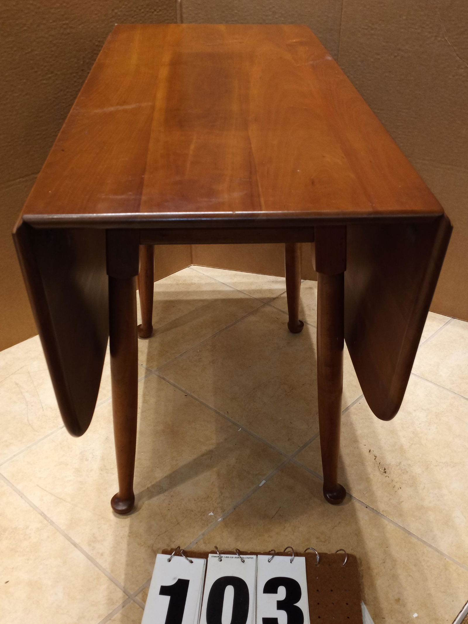 L. & J.G. Leopold Stickley Table: L. & J.G. signed Leopold Stickley cherry valley drop leaf Queen Anne style table. Signed Fayetteville, NY. Near mint condition. 46.75"w (when open). 42"d x 29"h. From the Manlius, NY Estate.
