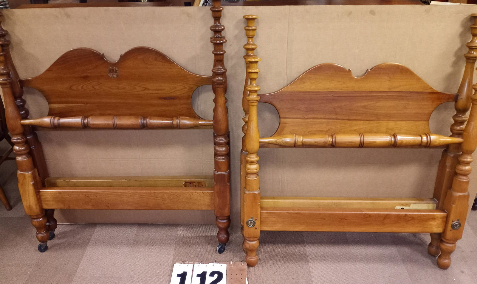 Two L. & J.G. Stickley Solid Cherry Rope Beds: Two L. & J.G. Stickley solid cherry valley rope style beds with side rails. Bed size is a single (twin). Headboard is 42"w x 50.25"h. Footboard is 42"w x 44.5"h. From the Manlius, NY Estate.