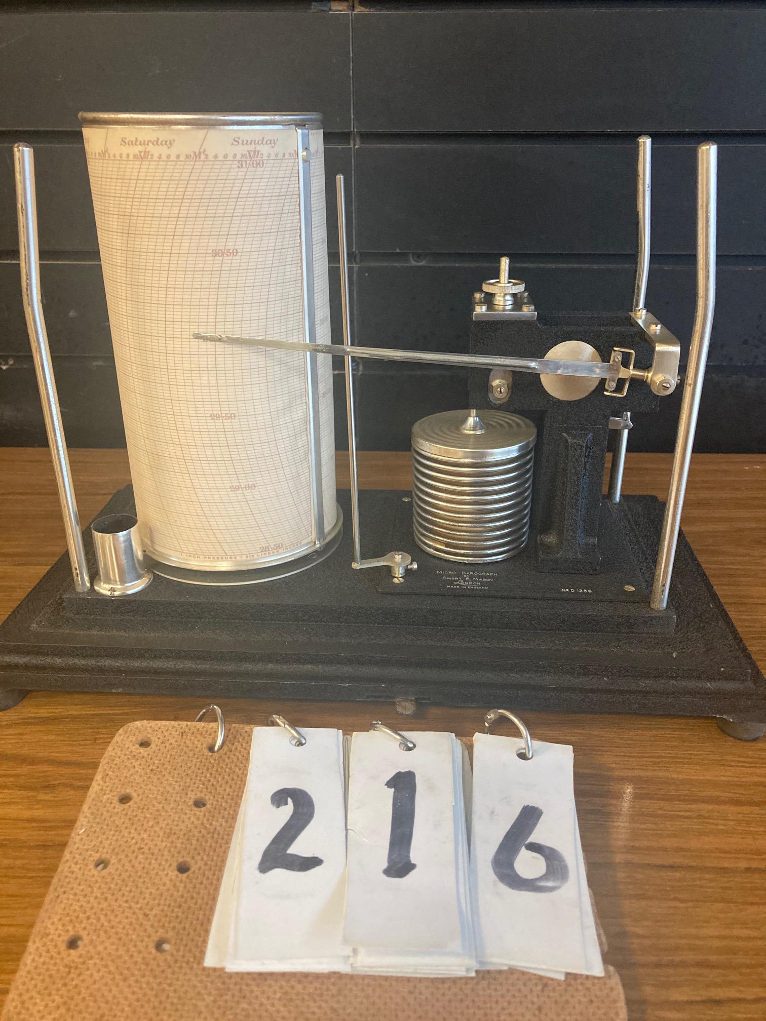 Short & Mason Micro Barograph: Short & Mason micro barograph. Made in London, England. No. D 1256. Barograph has a black metal finished case. This instrument is directly out of a Syracuse, NY Estate and this is the first time it is
