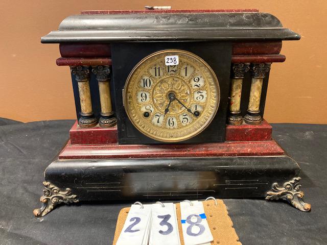 Two Antique Clocks: Two antique clocks. (1) Junghans 1890s German inlaid clock with chimes. No side chime level. Has time and strike. Unknown if the clock works. 17.5"h x 12.5"w x 7"d. (1) Seth Thomas time and strike mar