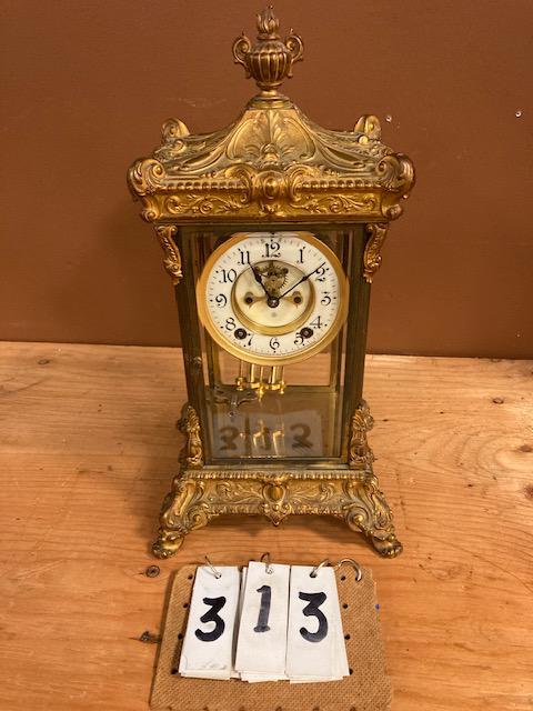 Ansonia Regulator Clock: Excellent Ansonia crystal regulator clock with key and pendulum in working condition. Clock has open escapement. 16.5"h x 8.75"w x 8"d. From the Cortland, NY Estate.