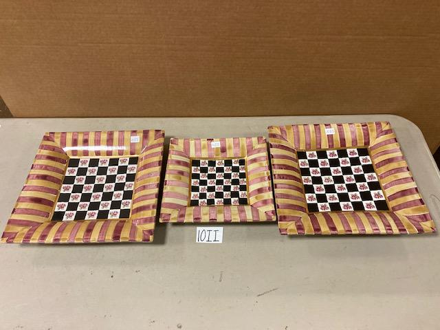 Three Vintage MacKenzie-Childs Ceramic Platters: Three vintage MacKenzie-Childs ceramic platters. Two large ceramic platters. Torquay-Frank and Mustard pattern. Burgundy and yellow color scheme. 12" x 12". One rare and retired medium ceramic platter