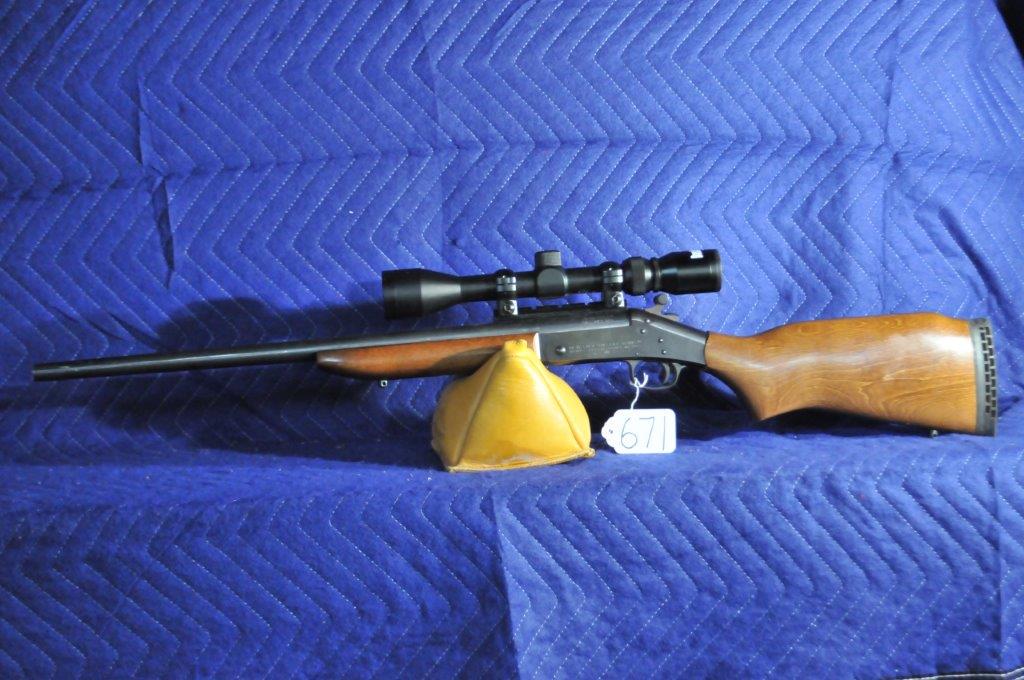 New England Firearms Handy Rifle: New England Firearms Handy Rifle. 243 Winchester. Bushnell 3x9 scope. 22" bbl. Hammer spur. Serial No. NW347915.