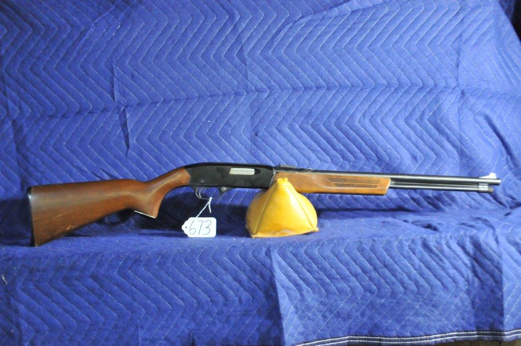 Winchester Model 275: Winchester Model 275. Pump gun. 22 WMR. A few marks on the stock. Some handling wear on the finish. Serial No. 128426.