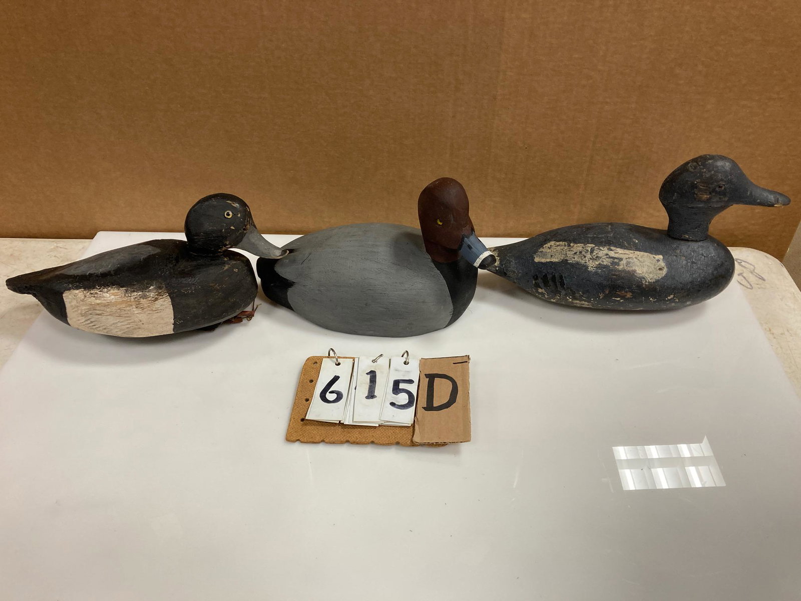Three Hand Carved Wood Duck Decoys: Three hand carved and hand painted wood duck decoys. Includes two bluebill drakes and one redhead drake. From the collection of one family in St. Lawrence County, NY who loved the Adirondacks and ever