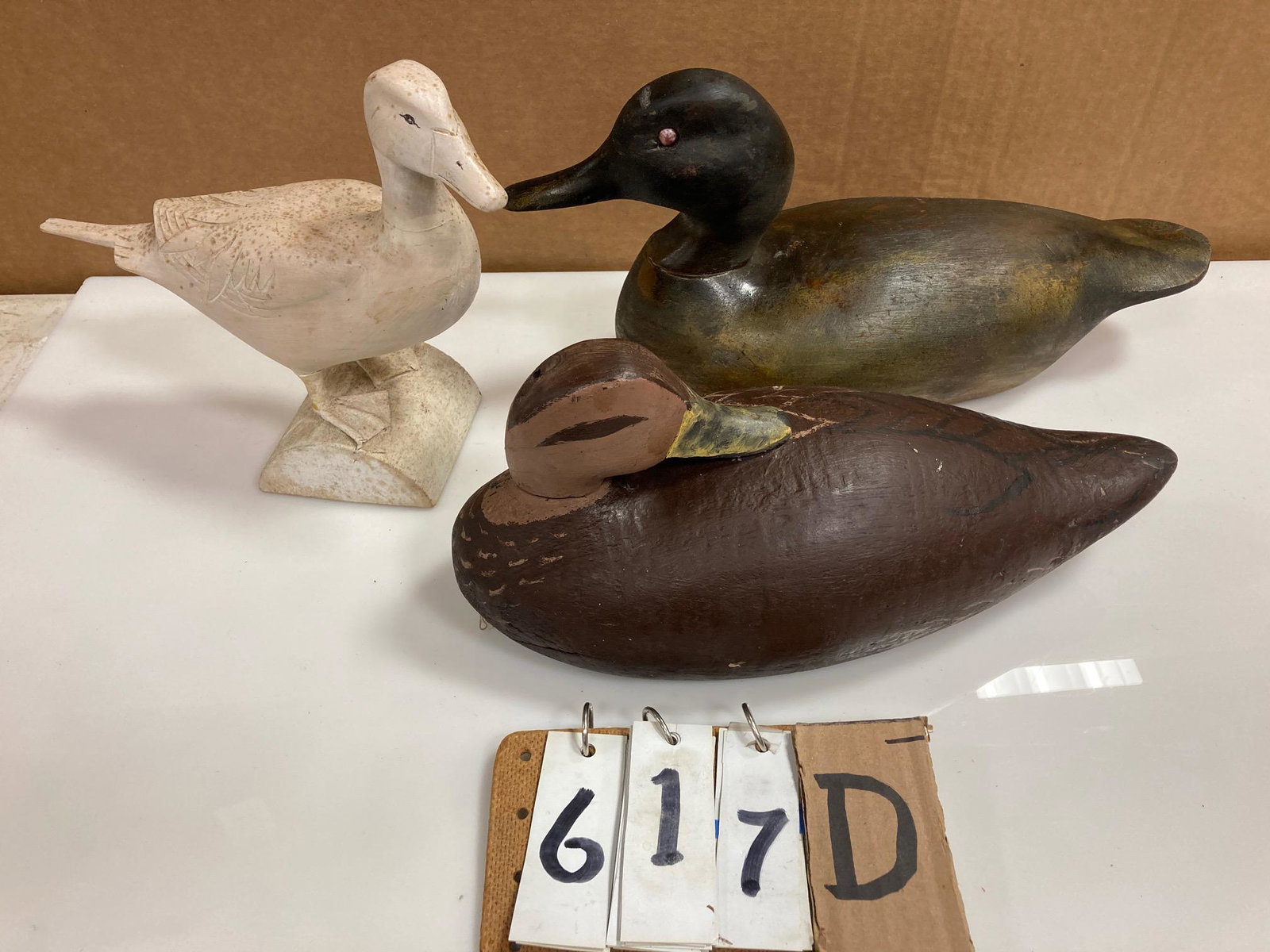 Three Hand Carved Wood Duck Decoys: Three hand carved and hand painted wood duck decoys. Includes one nicely done miniature snow goose, one mallard drake and one sleeping mallard hen. From the collection of one family in St. Lawrence Co