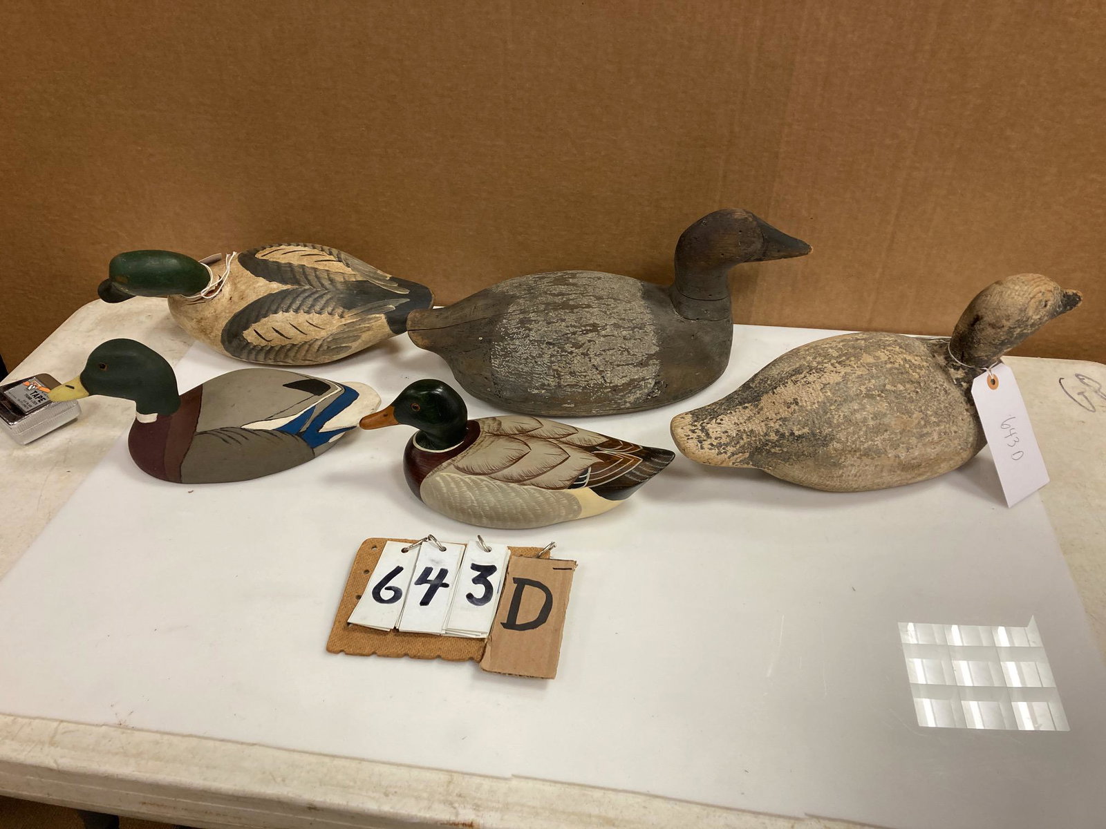 Five Hand Carved Wood Duck Decoys: Five hand carved and hand painted wood duck decoys. Includes one bufflehead drake (has broken head - see photos) carved by Harry Jobes, one canvasback hen, one canvasback drake and two other duck deco