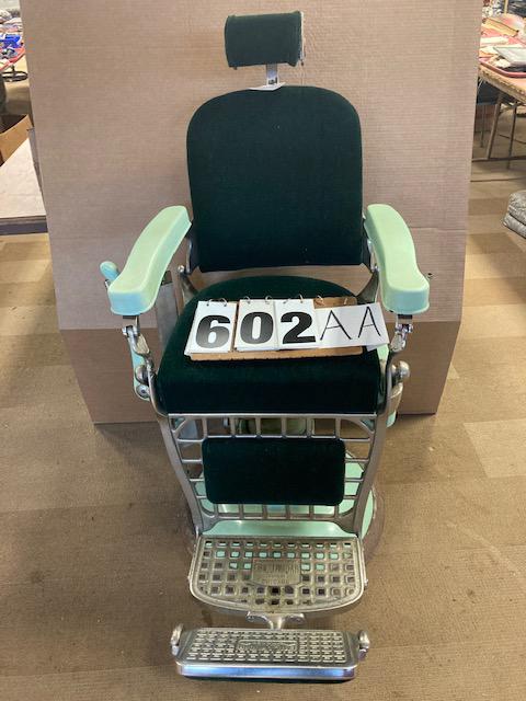 Beautiful Porcelain Emil J. Paidar Barber Chair: Beautiful porcelain barber chair manufactured by Emil J. Paidar of Chicago, IL. Chair is in a teal green color, nicely upholstered and has a head rest. Chair should go up and down and all around but d