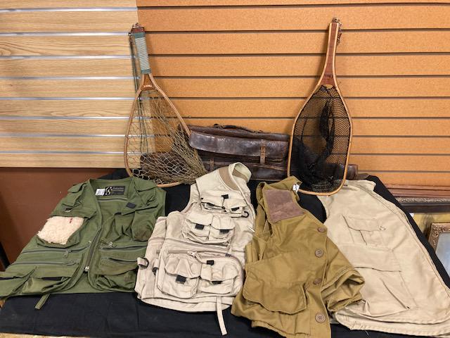 Seven Miscellaneous Sportsman's Items: Seven miscellaneous sportsman's items. One signed Orvis wood laminated trout net. One wood laminated trout net. Four hunting and fishing vests (Columbia, Saftback, Master Sportsman, Duxback). One leat