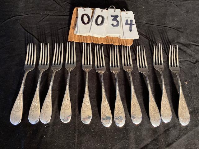 11 Matching 19c Sterling Silver Engraved Forks: 11 matching sterling silver engraved forks circa 19c. Pat. 1891. 18.50 troy oz. total weight. Please read the Terms and Conditions of this auction thoroughly for IMPORTANT bidder information.