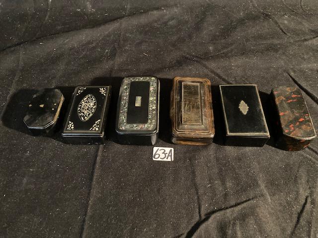 6 1830s European Snuff Boxes: 1- Paper Mache hinged snuff box with hand painted red and gold designs 2 7/8" w x 1 3/8" d x 1 "t 1- paper mache with silver inlay with hinged top 2 7/8" w x 1 3/4"d x 1"h 2- Looks like bone or shell