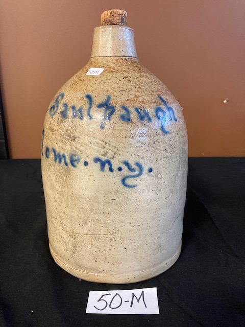 C.H. Saulbaugh, Rome, NY Jug with Cork Top: C.H. Saulbaugh, Rome, NY jug with cork top. 11.5"h x 7"dia. Top lip is 2" dia. Please read the Terms and Conditions of this auction thoroughly for IMPORTANT bidder information.